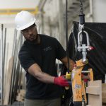 Army veteran Terrance Cook works in the crating department at TAKTYL in Turtle Creek. Pittsburgh Hires Veterans assisted with his job placement.